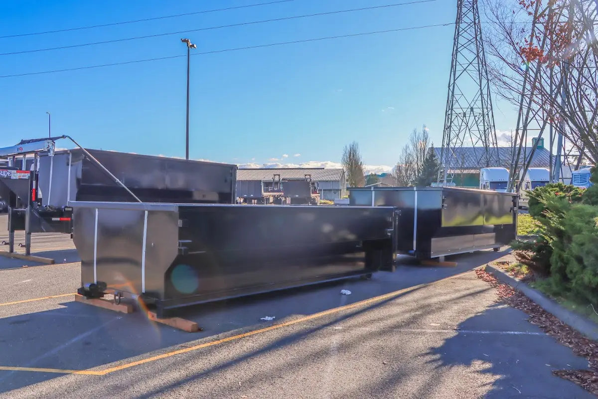 Roll-off dumpster ready for waste disposal at job site for Yard Waste Dumpster Rental in Mount Airy